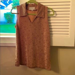 Sleeveless collared woman’s golf blouse